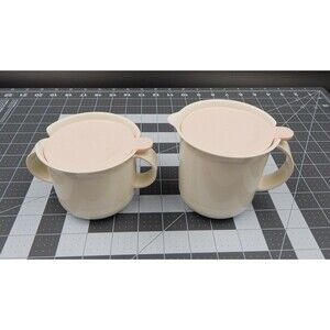 Tupperware 2310A 2309A Sugar 10 oz And Creamer 12 oz Ivory With Pale Pink Lids